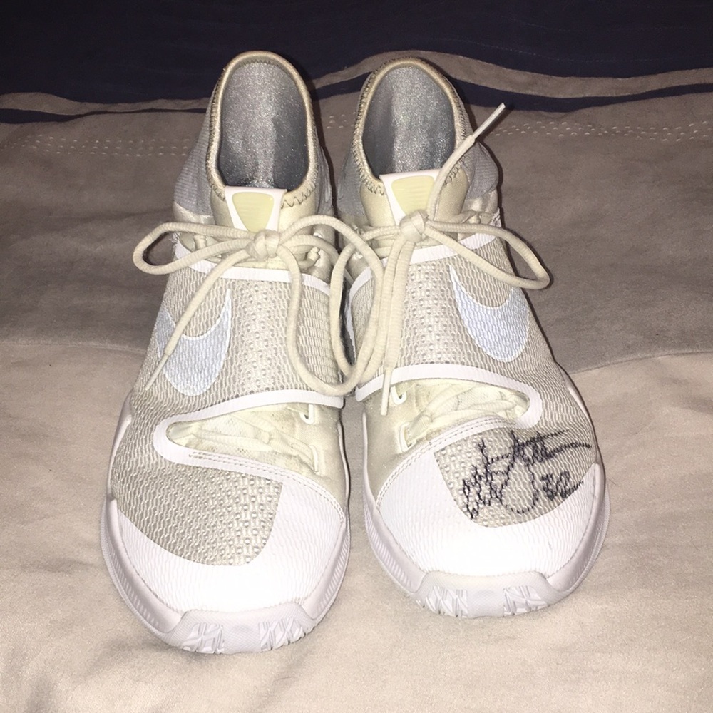 Nike autographed shoes.